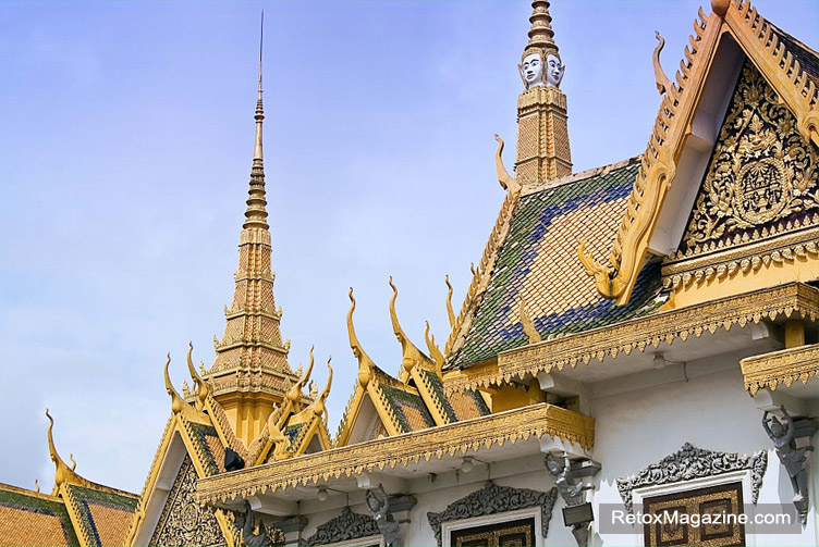 Intricate golden decor on the rooftops of the Royal Palace in Phnom Penh, Cambodia