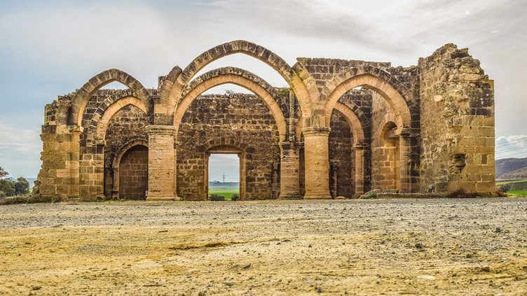 Fairytale-like remains of a gothic style church photographed from a distance