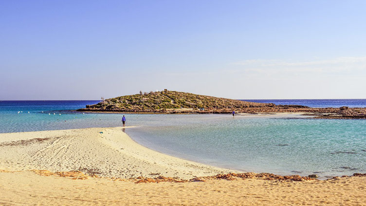 Beige sand blue sea and blue sky of Nissi beach 