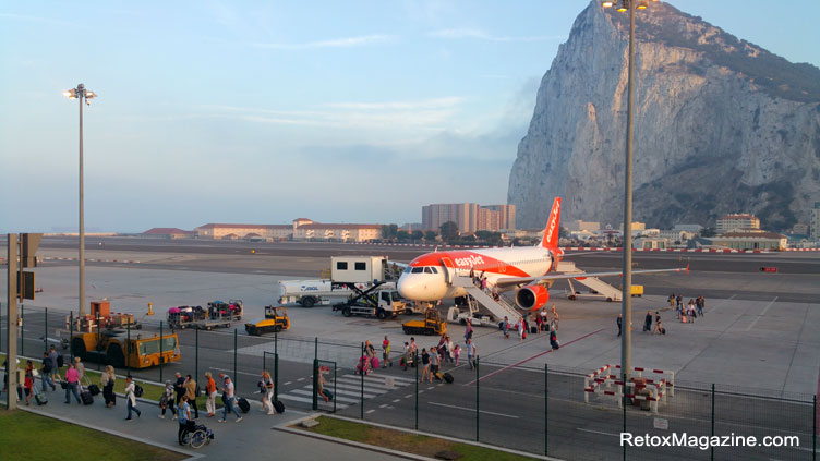 Passengers disembarking plane at Gibraltar International Airport