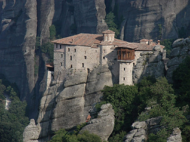 Eastern Orthodox monastery positioned on top of a gigantic rock