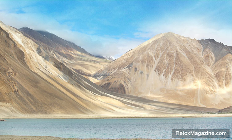 Ladakh Mountains set against water in the Himalaya