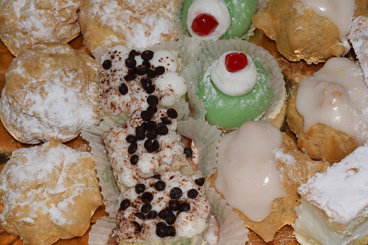 A variety of Sicilian desserts on display in a shop in Sicily, Italy. 