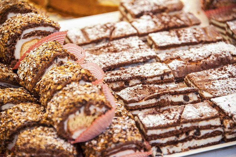 A close up photo of Italian pastries on display in a shop in Sicily, Italy. 