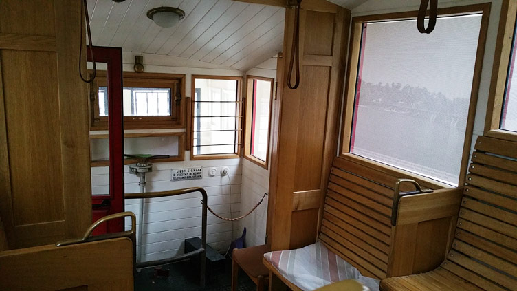 Funicular tram wooden vintage interior with wooden benches and wood panels