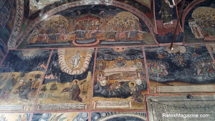 Close up of beautiful Christian drawings on the ceiling of the Romanian orthodox church