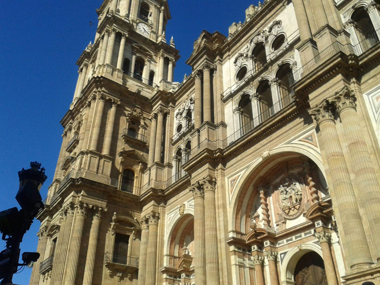 The exterior of La Manquita Mal-aga Cathedral featuring intricate and beautiful architecture