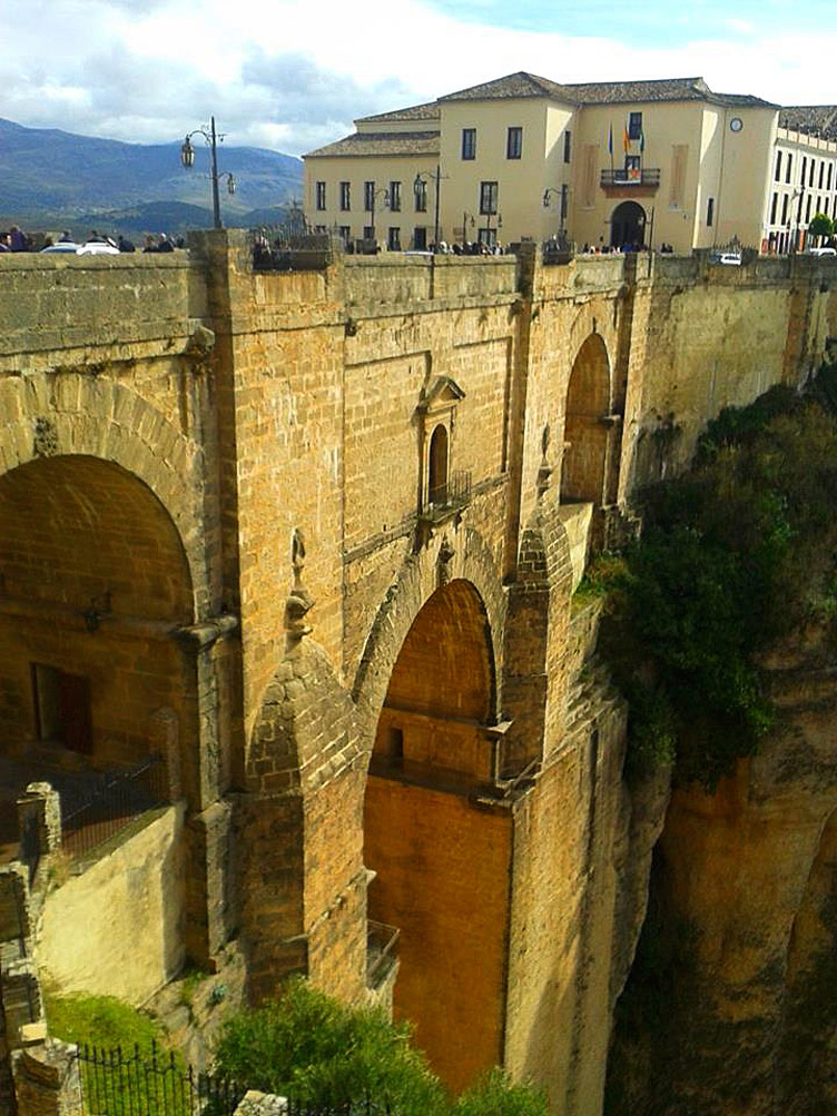 Visible is the tall structure of Puente Nuevo bridge in Ronda, Spain