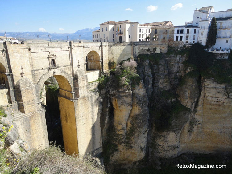 Ronda town on El Tajo gorge and stone bridge spanning the gorge, Spain