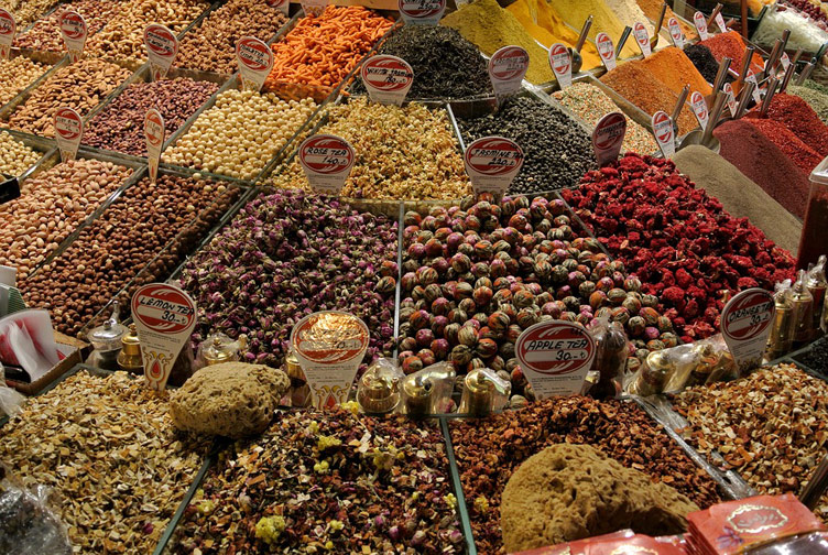 An abundance of spices and teas presented on a market stall at the Grand Bazaar in Istanbul