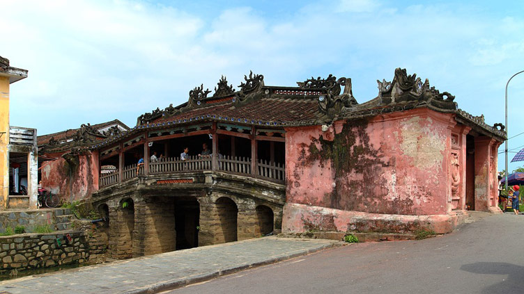 Beautifully 18th century Japanese covered bridge with intricately carved wooden pagoda